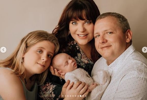 erika harvey with her husband and kids